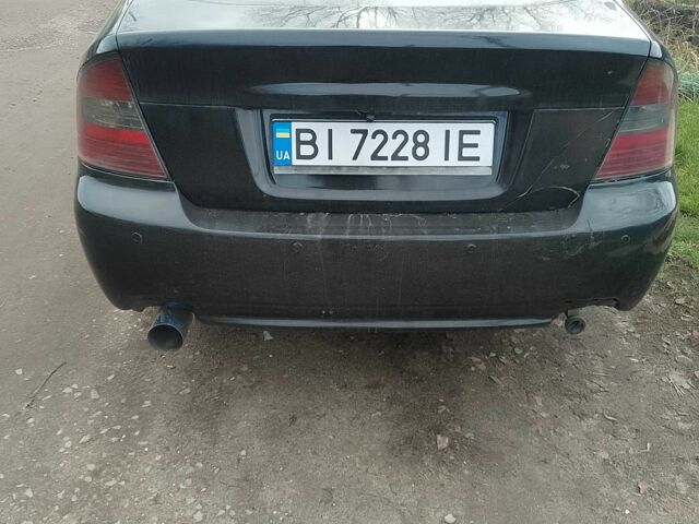 Чорний Субару Легасі, об'ємом двигуна 2 л та пробігом 358 тис. км за 3128 $, фото 7 на Automoto.ua