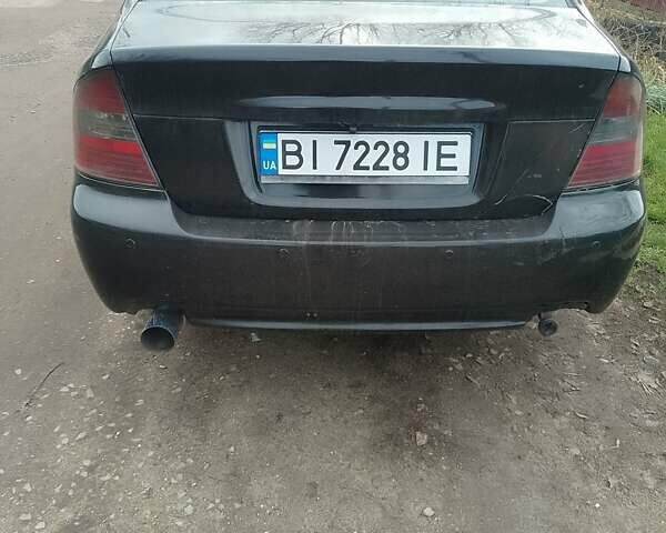 Чорний Субару Легасі, об'ємом двигуна 2 л та пробігом 358 тис. км за 3100 $, фото 7 на Automoto.ua
