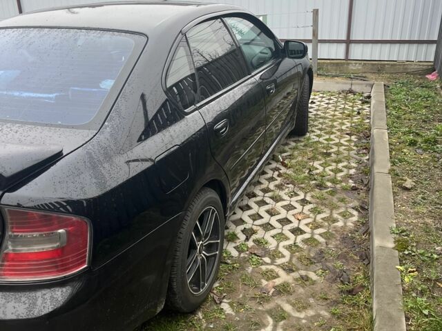 Черный Субару Легаси, объемом двигателя 2 л и пробегом 322 тыс. км за 4500 $, фото 2 на Automoto.ua