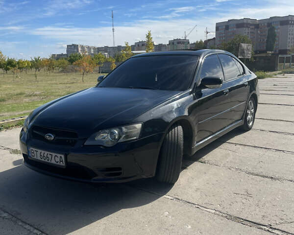 Черный Субару Легаси, объемом двигателя 2 л и пробегом 200 тыс. км за 4500 $, фото 1 на Automoto.ua