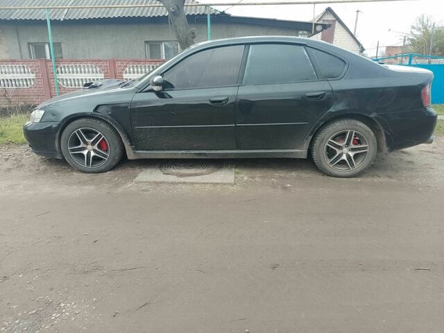 Чорний Субару Легасі, об'ємом двигуна 2 л та пробігом 358 тис. км за 3128 $, фото 6 на Automoto.ua