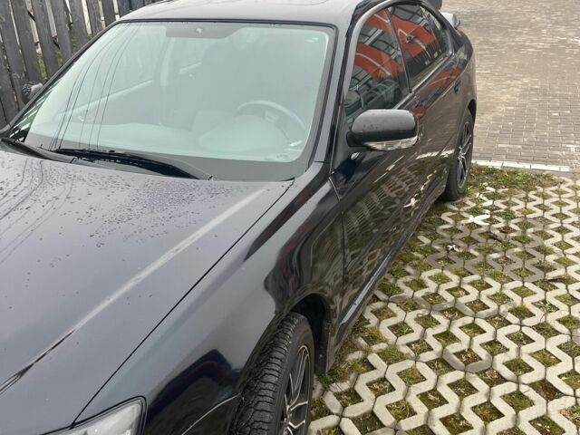 Черный Субару Легаси, объемом двигателя 2 л и пробегом 322 тыс. км за 4500 $, фото 4 на Automoto.ua