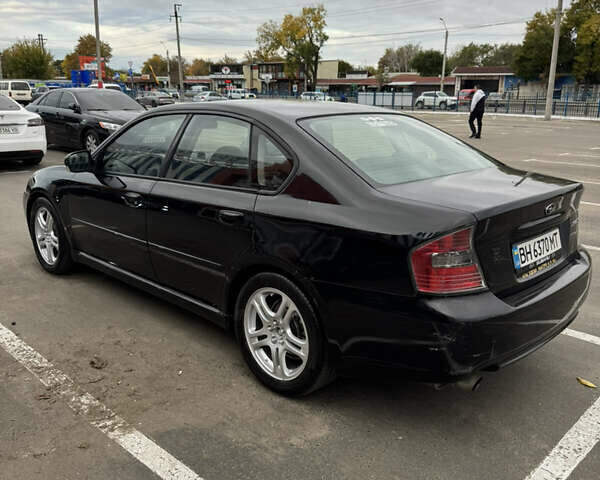 Чорний Субару Легасі, об'ємом двигуна 2.46 л та пробігом 251 тис. км за 3499 $, фото 4 на Automoto.ua