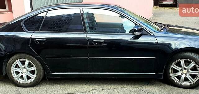 Чорний Субару Легасі, об'ємом двигуна 2 л та пробігом 106 тис. км за 5200 $, фото 2 на Automoto.ua