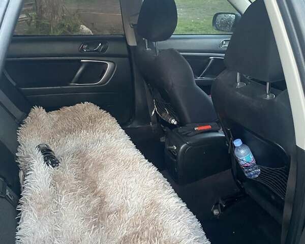 Черный Субару Легаси, объемом двигателя 1.99 л и пробегом 240 тыс. км за 4800 $, фото 1 на Automoto.ua