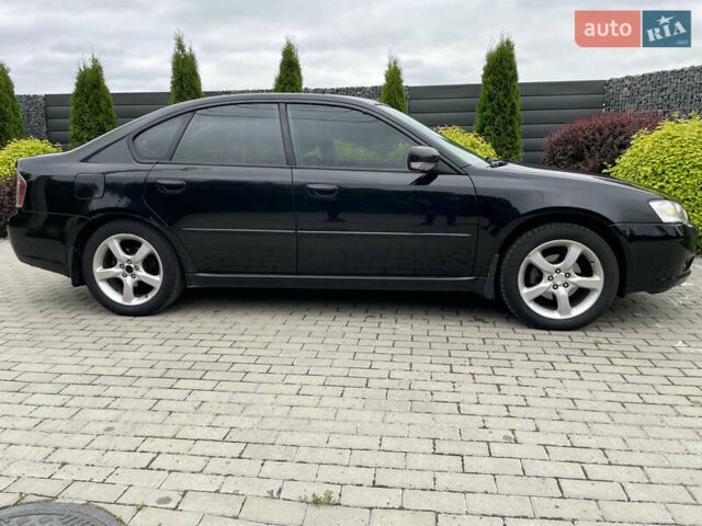 Черный Субару Легаси, объемом двигателя 1.99 л и пробегом 324 тыс. км за 4300 $, фото 2 на Automoto.ua