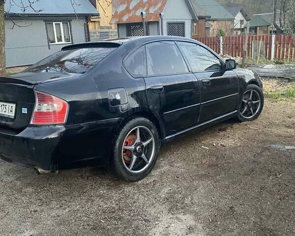 Черный Субару Легаси, объемом двигателя 1.99 л и пробегом 240 тыс. км за 4800 $, фото 3 на Automoto.ua