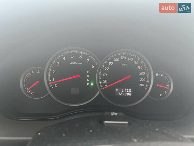 Черный Субару Легаси, объемом двигателя 1.99 л и пробегом 327 тыс. км за 5500 $, фото 1 на Automoto.ua