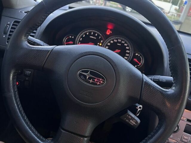 Чорний Субару Легасі, об'ємом двигуна 2 л та пробігом 217 тис. км за 5300 $, фото 7 на Automoto.ua