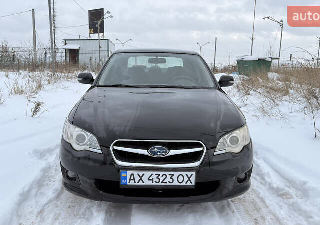 Черный Субару Легаси, объемом двигателя 2 л и пробегом 235 тыс. км за 5500 $, фото 1 на Automoto.ua