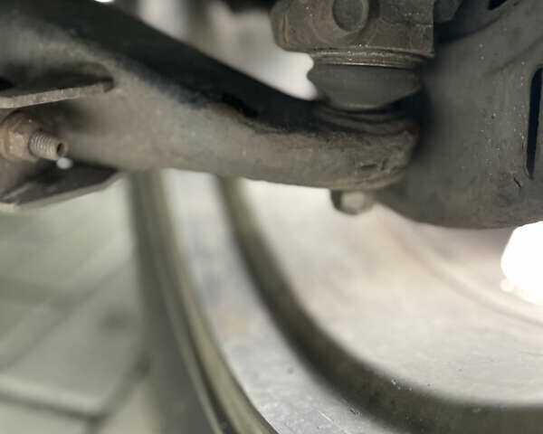 Черный Субару Легаси, объемом двигателя 1.99 л и пробегом 324 тыс. км за 4300 $, фото 4 на Automoto.ua