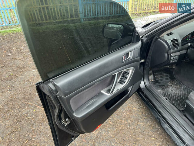 Черный Субару Легаси, объемом двигателя 1.99 л и пробегом 327 тыс. км за 5500 $, фото 12 на Automoto.ua