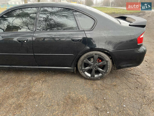 Черный Субару Легаси, объемом двигателя 1.99 л и пробегом 327 тыс. км за 5500 $, фото 8 на Automoto.ua