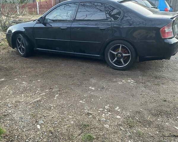 Черный Субару Легаси, объемом двигателя 1.99 л и пробегом 240 тыс. км за 4800 $, фото 4 на Automoto.ua