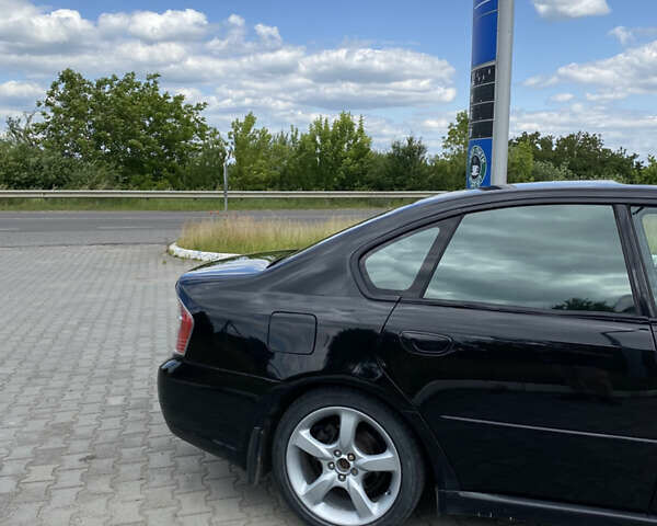 Черный Субару Легаси, объемом двигателя 1.99 л и пробегом 212 тыс. км за 5450 $, фото 2 на Automoto.ua