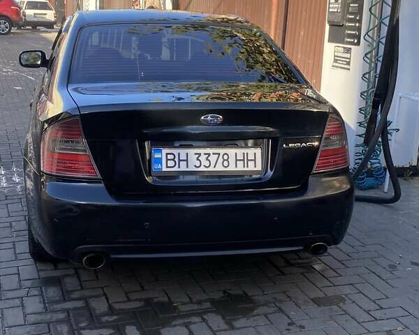 Черный Субару Легаси, объемом двигателя 1.99 л и пробегом 280 тыс. км за 4800 $, фото 2 на Automoto.ua