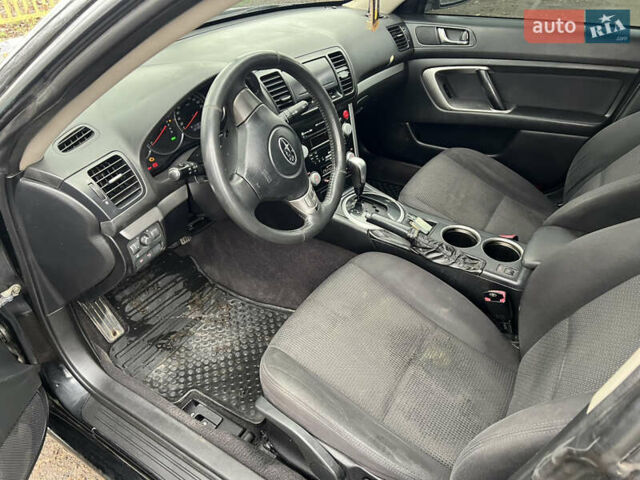 Черный Субару Легаси, объемом двигателя 1.99 л и пробегом 327 тыс. км за 5500 $, фото 11 на Automoto.ua