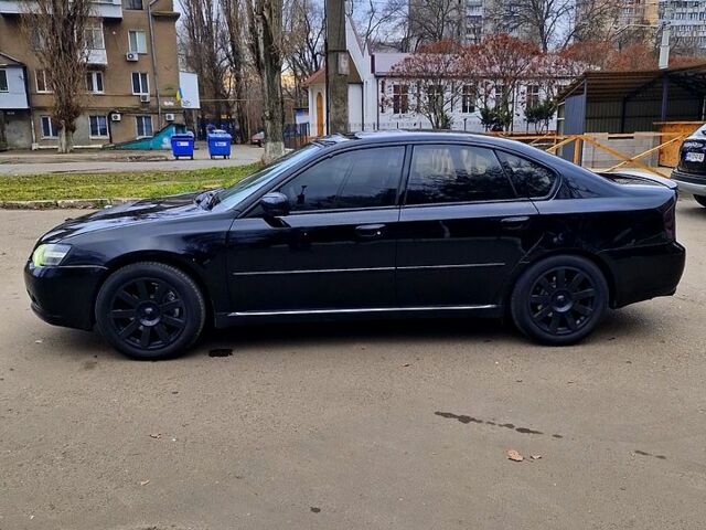 Черный Субару Легаси, объемом двигателя 3 л и пробегом 270 тыс. км за 4999 $, фото 2 на Automoto.ua