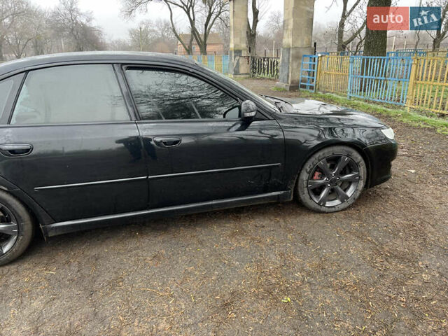 Черный Субару Легаси, объемом двигателя 1.99 л и пробегом 327 тыс. км за 5500 $, фото 6 на Automoto.ua