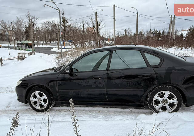 Черный Субару Легаси, объемом двигателя 2 л и пробегом 235 тыс. км за 5500 $, фото 7 на Automoto.ua