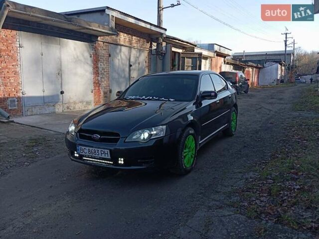 Чорний Субару Легасі, об'ємом двигуна 2.46 л та пробігом 370 тис. км за 4500 $, фото 1 на Automoto.ua