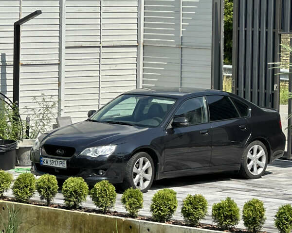 Черный Субару Легаси, объемом двигателя 2.46 л и пробегом 285 тыс. км за 5200 $, фото 2 на Automoto.ua