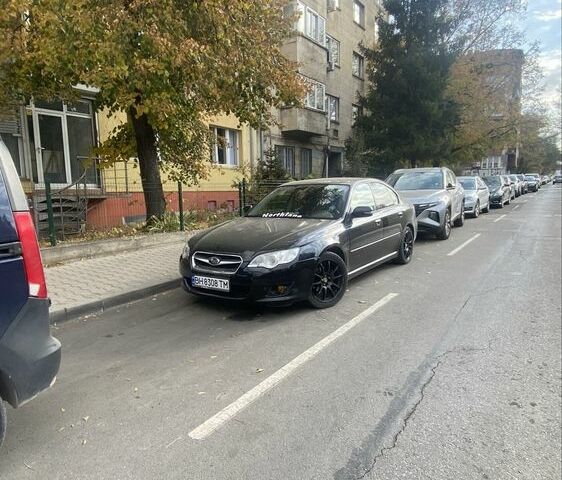 Черный Субару Легаси, объемом двигателя 2 л и пробегом 185 тыс. км за 6000 $, фото 1 на Automoto.ua