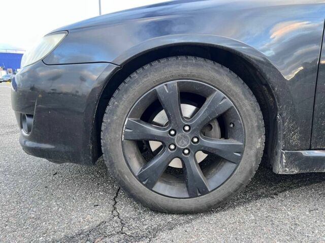 Черный Субару Легаси, объемом двигателя 2.5 л и пробегом 260 тыс. км за 5200 $, фото 2 на Automoto.ua