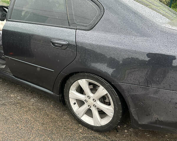 Черный Субару Легаси, объемом двигателя 2.46 л и пробегом 285 тыс. км за 5200 $, фото 10 на Automoto.ua