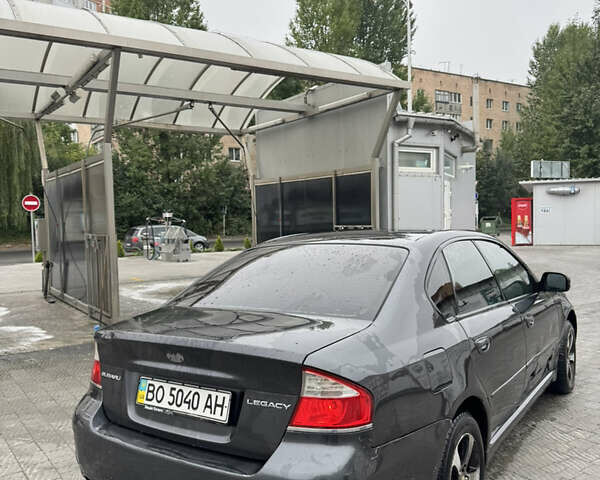 Чорний Субару Легасі, об'ємом двигуна 2 л та пробігом 229 тис. км за 3400 $, фото 2 на Automoto.ua