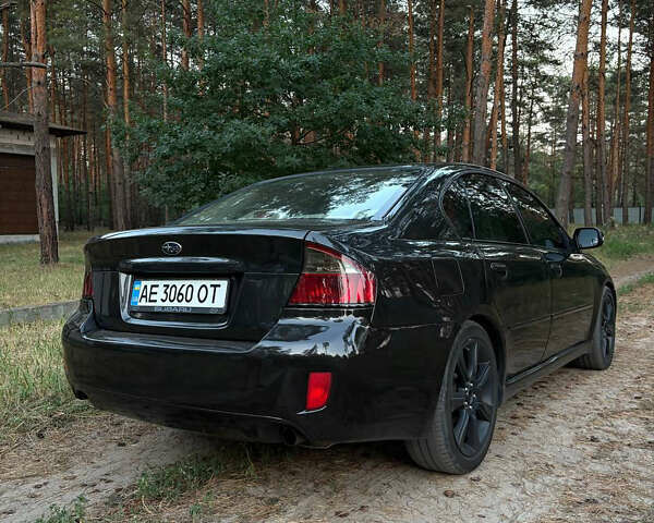 Черный Субару Легаси, объемом двигателя 1.99 л и пробегом 226 тыс. км за 4600 $, фото 3 на Automoto.ua