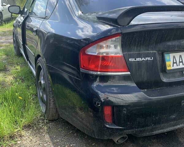 Черный Субару Легаси, объемом двигателя 2.46 л и пробегом 200 тыс. км за 4000 $, фото 4 на Automoto.ua