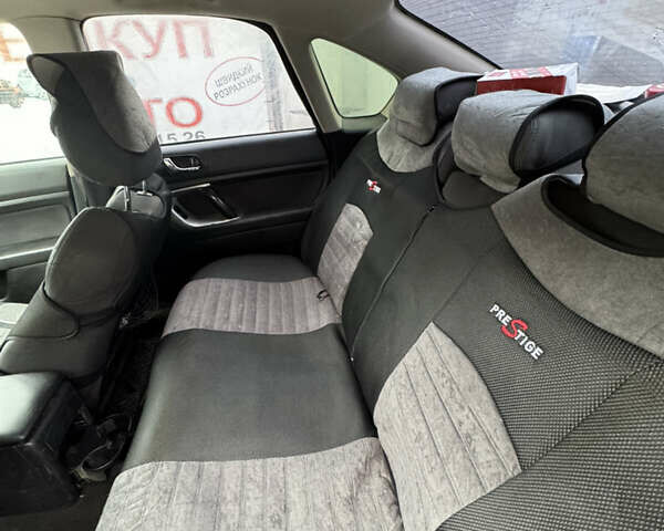 Чорний Субару Легасі, об'ємом двигуна 2 л та пробігом 229 тис. км за 3400 $, фото 12 на Automoto.ua