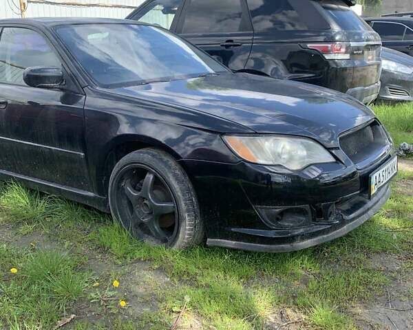 Черный Субару Легаси, объемом двигателя 2.46 л и пробегом 200 тыс. км за 4000 $, фото 2 на Automoto.ua