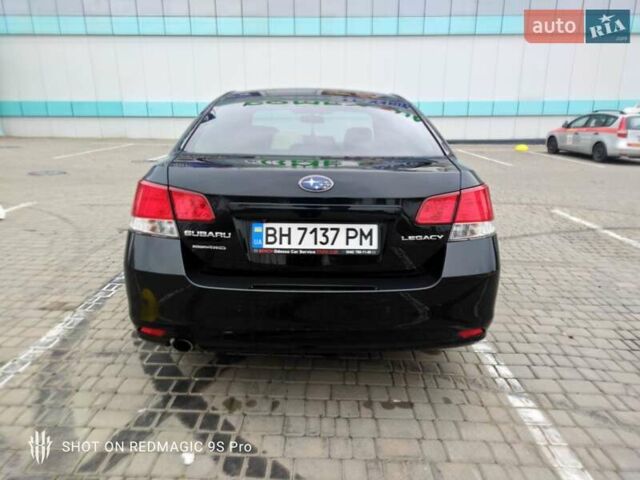 Черный Субару Легаси, объемом двигателя 2.46 л и пробегом 205 тыс. км за 8400 $, фото 4 на Automoto.ua
