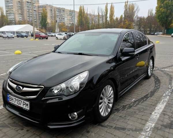 Черный Субару Легаси, объемом двигателя 2.46 л и пробегом 205 тыс. км за 8400 $, фото 5 на Automoto.ua