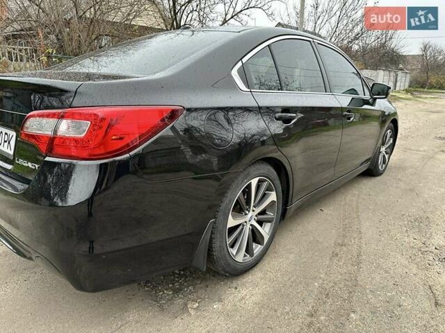 Чорний Субару Легасі, об'ємом двигуна 2.46 л та пробігом 177 тис. км за 12500 $, фото 1 на Automoto.ua