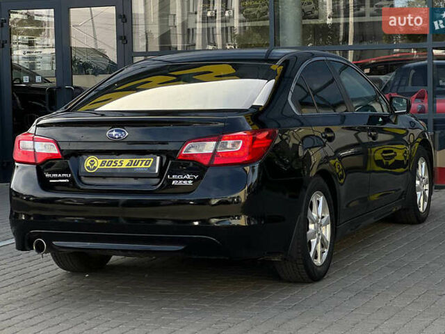 Черный Субару Легаси, объемом двигателя 2.5 л и пробегом 124 тыс. км за 10600 $, фото 5 на Automoto.ua