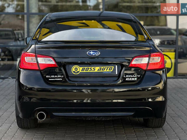 Черный Субару Легаси, объемом двигателя 2.5 л и пробегом 124 тыс. км за 10600 $, фото 4 на Automoto.ua