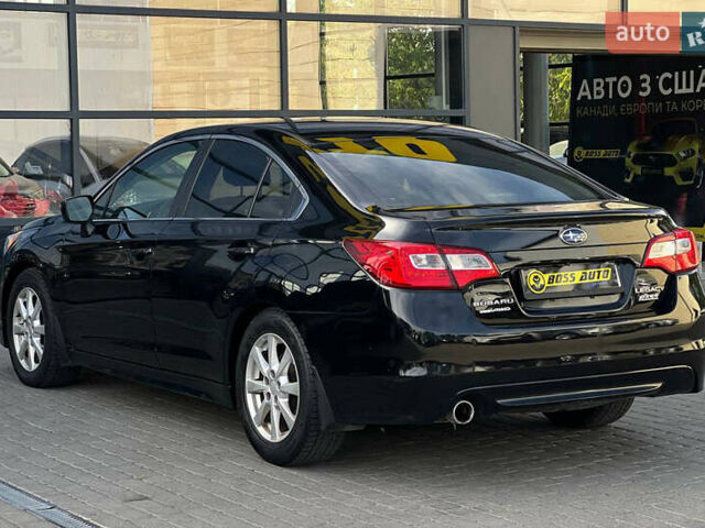 Черный Субару Легаси, объемом двигателя 2.5 л и пробегом 124 тыс. км за 10600 $, фото 3 на Automoto.ua