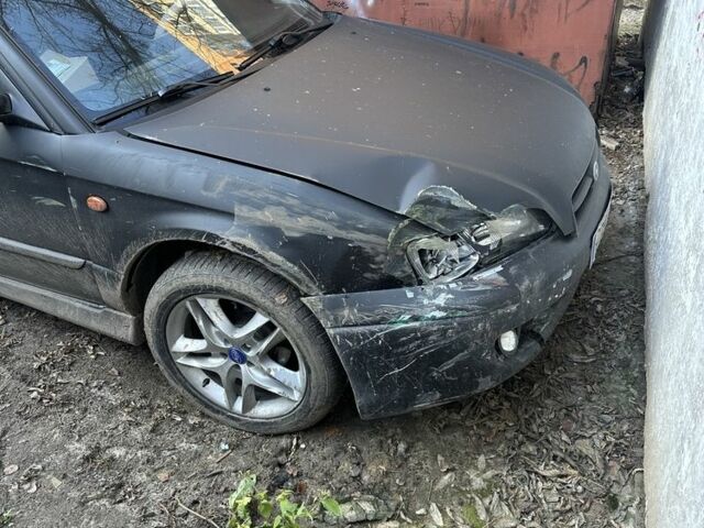 Черный Субару Легаси, объемом двигателя 2.5 л и пробегом 186 тыс. км за 1302 $, фото 6 на Automoto.ua