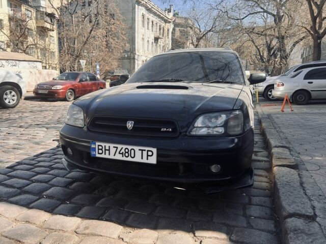 Черный Субару Легаси, объемом двигателя 2.5 л и пробегом 250 тыс. км за 2999 $, фото 6 на Automoto.ua
