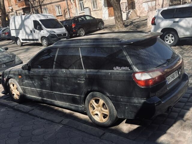 Черный Субару Легаси, объемом двигателя 2.5 л и пробегом 250 тыс. км за 2999 $, фото 3 на Automoto.ua