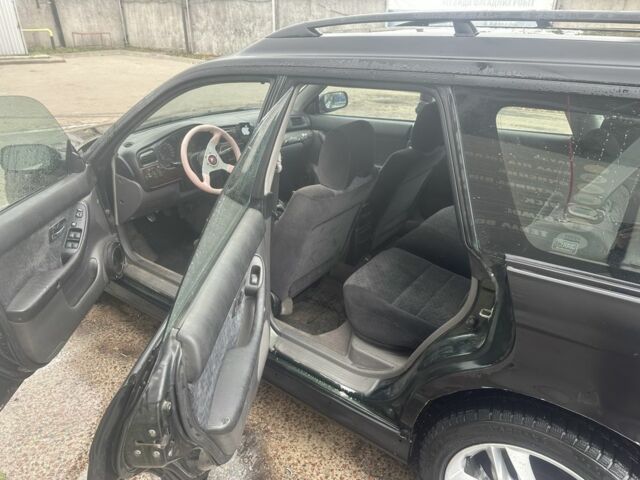 Черный Субару Легаси, объемом двигателя 2.5 л и пробегом 180 тыс. км за 2738 $, фото 5 на Automoto.ua