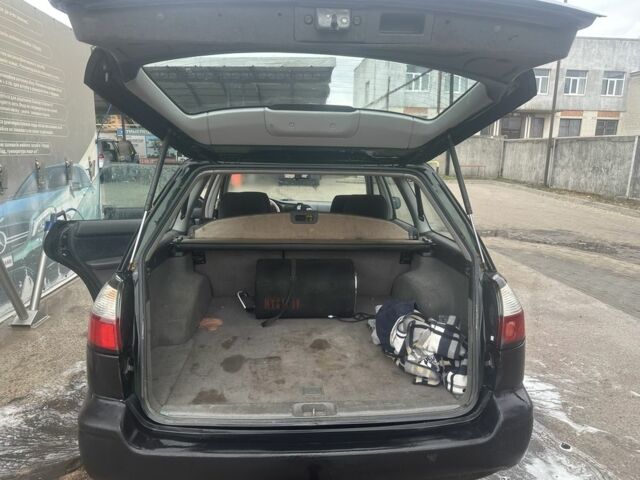 Черный Субару Легаси, объемом двигателя 2.5 л и пробегом 180 тыс. км за 2738 $, фото 7 на Automoto.ua