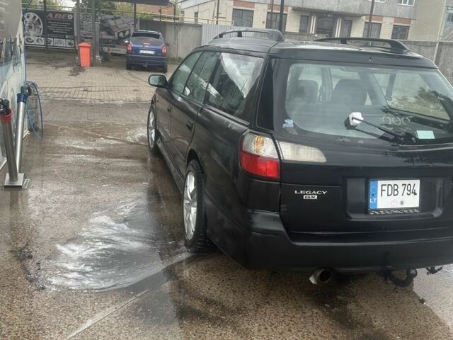 Черный Субару Легаси, объемом двигателя 2.5 л и пробегом 186 тыс. км за 1302 $, фото 3 на Automoto.ua