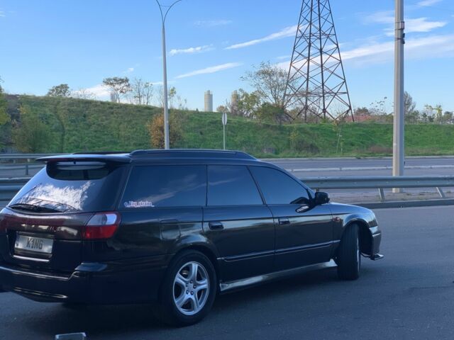 Черный Субару Легаси, объемом двигателя 2.5 л и пробегом 145 тыс. км за 4200 $, фото 10 на Automoto.ua