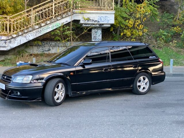 Черный Субару Легаси, объемом двигателя 2.5 л и пробегом 145 тыс. км за 4200 $, фото 7 на Automoto.ua