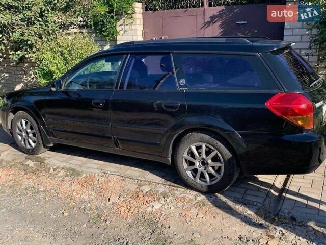 Черный Субару Легаси, объемом двигателя 2.5 л и пробегом 280 тыс. км за 5500 $, фото 4 на Automoto.ua