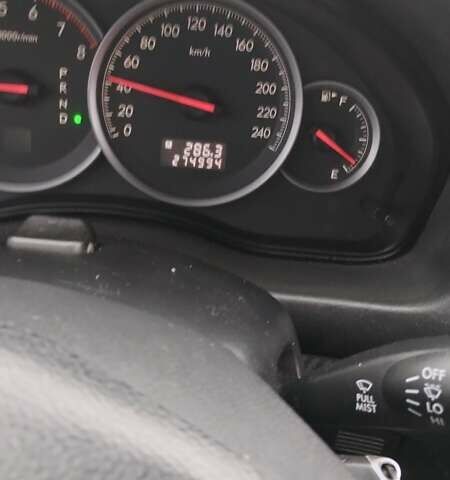 Черный Субару Легаси, объемом двигателя 2.46 л и пробегом 270 тыс. км за 7500 $, фото 2 на Automoto.ua